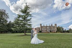 Award winning photograph of a bride and groom in the grounds of Cave Castle.