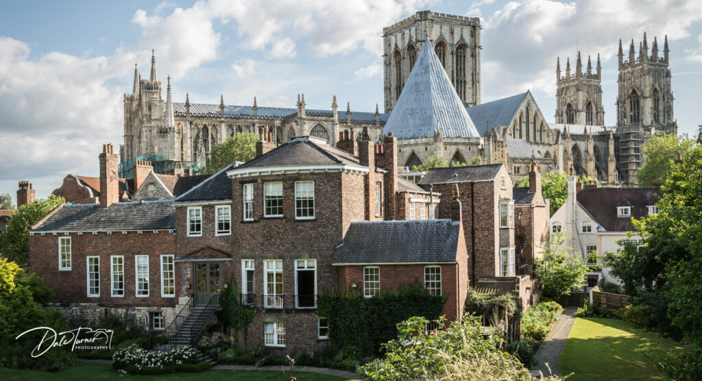 Grays Court on a sunny day with York Minster in the background.
