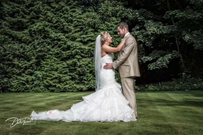 Bride and groom in the grounds of The Parsonage Hotel & Spa, Escrick.
