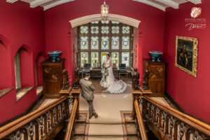 Award winning photograph of a bride and groom on the staircase inside Carlton Towers.